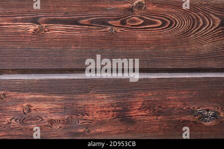 Texture of natural mahogany wood from two horizontal boards, background. Stock Photo