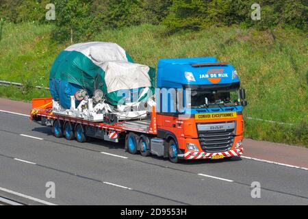 Jan De Rijk; Aerospace Logistics; Convoi Exceptionnel Haulage delivery trucks, lorry, aircraft parts transportation, truck, cargo carrier, oversize loads, abnormal Indivisible load contractors DAF vehicle, European commercial transport industry, M61 at Manchester, UK Stock Photo