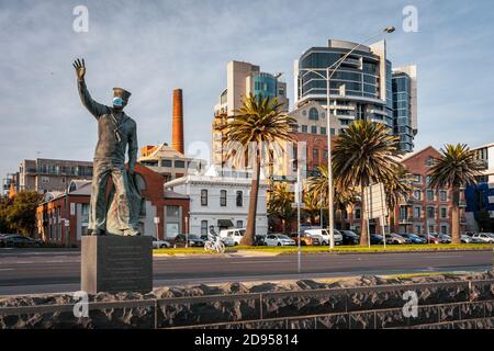 Melbourne, Australia - Statue in Port Melbourne with face mask on put on by pranksters Stock Photo