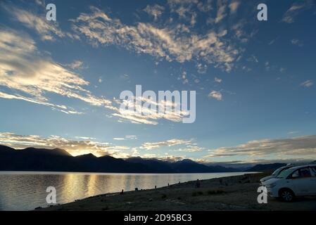 Sunrise over the Pangong Lake. Located in the Changthang region, Ladakh, it is one of the world's highest saltwater lakes, at an elevation of 4,350m Stock Photo