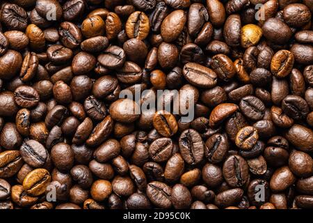 Mixed coffee beans. Arabica and robusta. Top view. Stock Photo
