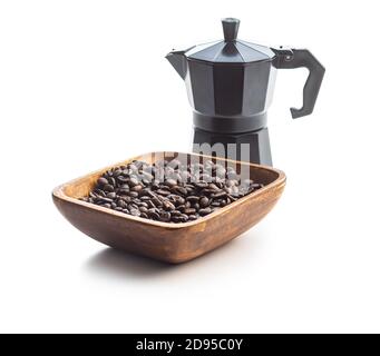 Coffee beans and bialetti coffee maker.  Moka pot isolated on white background. Stock Photo