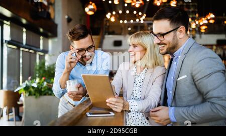Business colleagues having conversation during coffee break Stock Photo