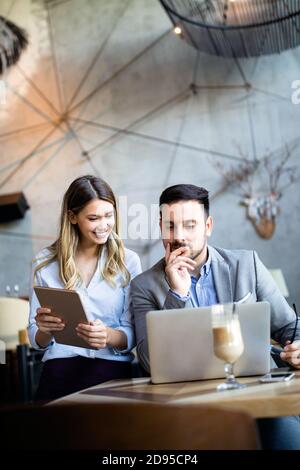Business colleagues having conversation during coffee break Stock Photo