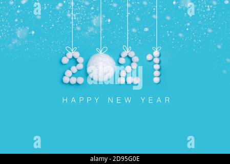 2021 New Years numbers made of white artificial snow on blue background Stock Photo