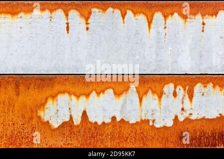 Orange rust pattern on a flat metal surface Stock Photo