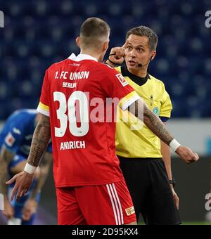 November 2nd, 2020, PreZero-Arena, Sinsheim, GER, 1.FBL, TSG 1899 Hoffenheim vs 1.Union Berlin, DFL regulations prohibit any use of photographs as image sequences and/or quasi-video. in the picture referee Robert Hartmann in conversation with Robert Andrich (Union Berlin) | usage worldwide Stock Photo