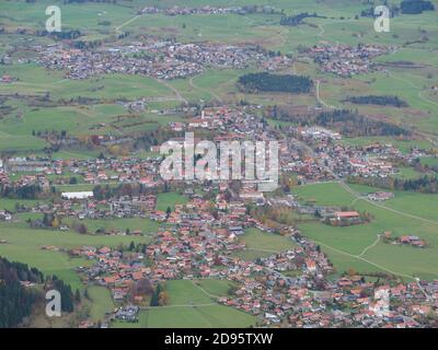 Panoramic view over the little german town Pfronten in the region Allgäu in Bavaria seen from the mountain called Breitenberg Stock Photo