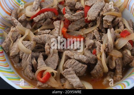 beef meat with onion and red paprika for mexican tacos food Stock Photo