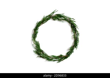 Wreath made from conifer tree branches on a white background Stock Photo
