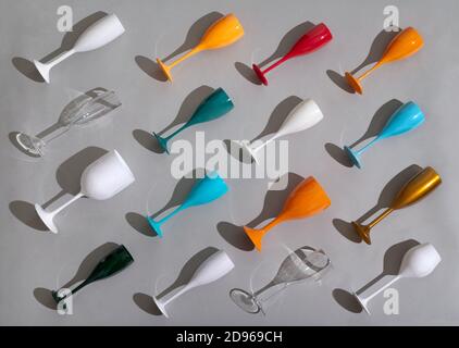 High angle view of wine glasses pattern on gray background