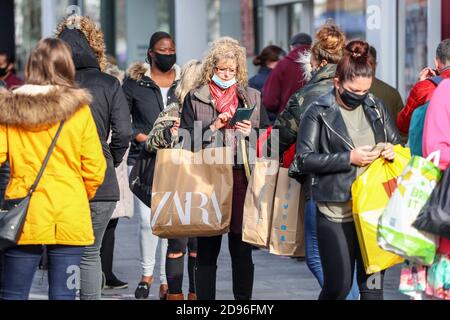 Southampton, Hampshire, UK. 3rd November 2020. Southampton High Street busy with shoppers ahead of the England’s second Covid lockdown. Shoppers queue outside of Primark. Credit Stuart Martin/Alamy Live News Stock Photo