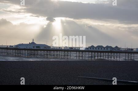 Late afternoon sunrays breaking through cloud on an Autumnal day in Brighton, East Sussex Stock Photo