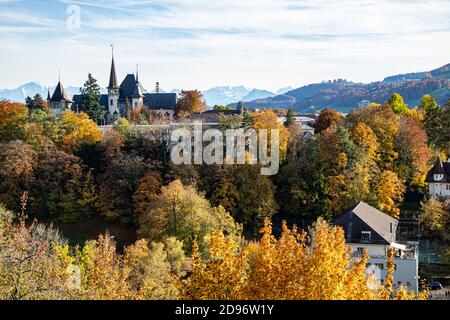 Bern Switzerland - 10.25.2020 View over Bern and the Bern History Museum and Aare river in the Autumn with the Alps in the background Stock Photo