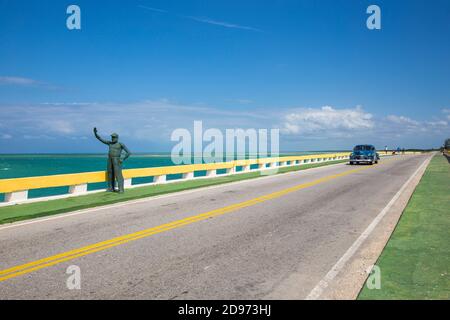 Cuba, Ciego de Avila Province, Jardines del Rey, Ernest Hemingway statue on causeway linking Cayo Coco to Cayo Guillermo