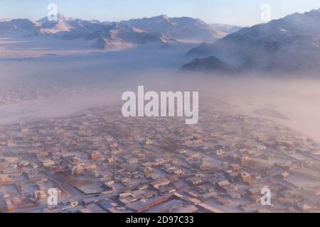 Town of Khvod, Valley with snow and rocks, Altai mountains, West Mongolia, Mongolia