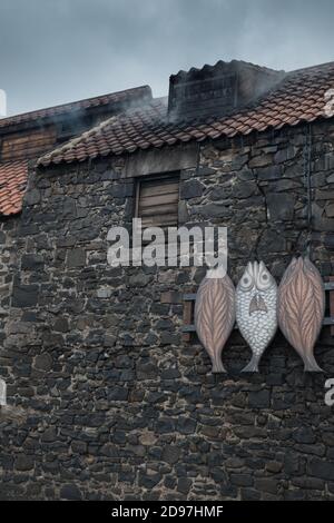 Craster village smokehouse Stock Photo