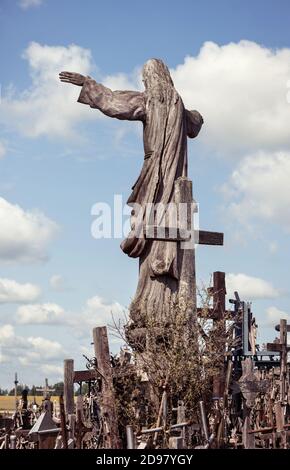 Wooden statue of Jesus Christ at the Hill of Crosses, an unique monument of history and religious folk art and most important Lithuanian Catholic pilg Stock Photo