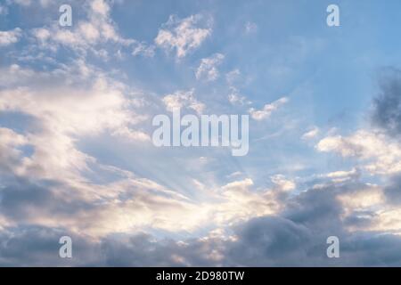Sun rays in the dramatic cloudy sky. Natural texture and background Stock Photo