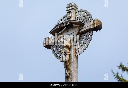 Crucifixion of Christ and a large number of crosses at Hill of Crosses. Hill of Crosses is a unique monument of history and religious folk art in Siau Stock Photo