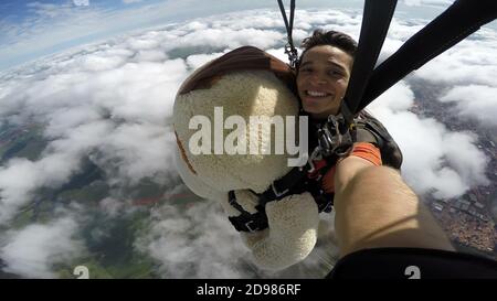 Skydiving Teddy Bear extreme sports Stock Photo