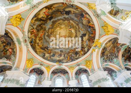 Painting depicting paradise with Holy Trinity in the centre surrounded by a host of saints. Cathedral of St.Gallen (former Benedictine Abbey of Stock Photo