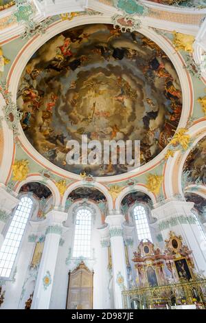 Painting depicting paradise with Holy Trinity in the centre surrounded by a host of saints.Cathedral of St.Gallen (former Benedictine Abbey of Stock Photo