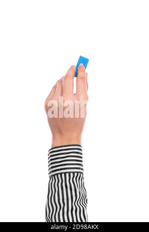 Female hand with eraser isolated on white. Stock Photo