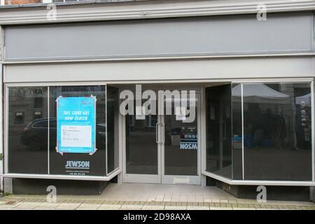 Dorchester, Dorset, UK.  3rd November 2020.   A closed sign in the window of an empty shop which was a TUI travel agents in South Street at Dorchester in Dorset which shut during the Covid-19 pandemic.  Picture Credit: Graham Hunt/Alamy Live News Stock Photo