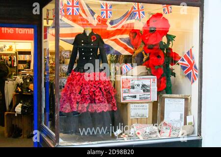 Dorchester, Dorset, UK.  3rd November 2020.   Julia’s House charity Shop in South Street at Dorchester in Dorset which has a Remembrance Day display in the shop window before it has to close for the Covid-19 lockdown on Thursday.  Picture Credit: Graham Hunt/Alamy Live News Stock Photo