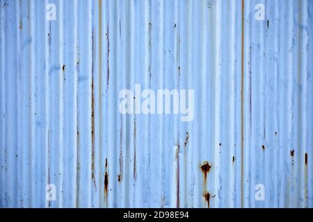 Wall of rusty corrugated metal, light blue Stock Photo