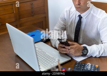 Young businessman working from home Stock Photo