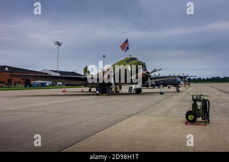 Shiloh, IL--Sept 12, 2011; restored AC-47 puff the magic dragon gun ship parked on tarmac with American flag displayed out of cockpit window Stock Photo