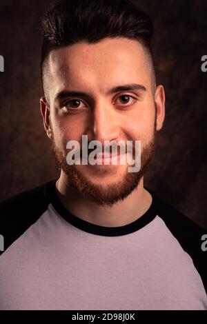 Handsome man posing at a studio Stock Photo
