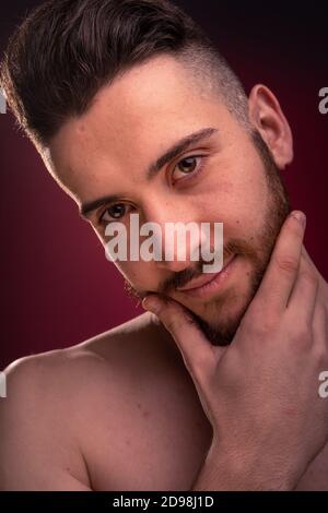 Handsome man posing at a studio Stock Photo