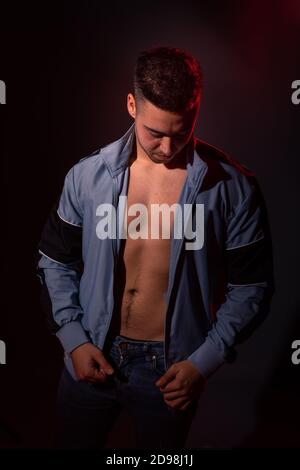 Handsome man posing at a studio Stock Photo