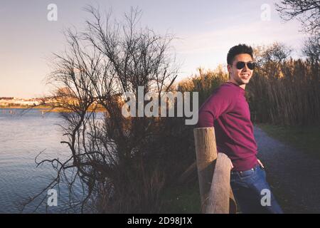 Young man posing at the park. Stock Photo