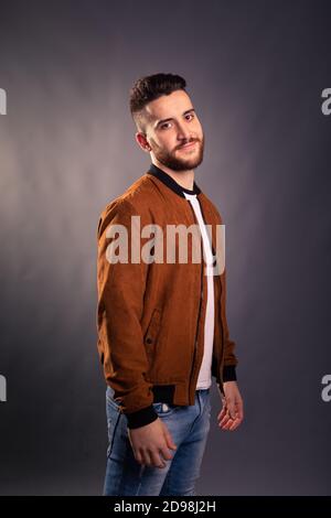 Handsome man posing at a studio Stock Photo