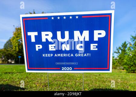 Herndon, USA - November 3, 2020: Presidential election political sign placard in support of Donald J. Trump with Keep America Great 2020 text in votin
