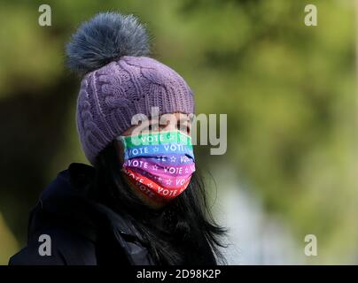 Raleigh, North Carolina, USA. 3rd Nov, 2020. Volunteer poll observer, EILEEN GATES of Raleigh outside Project Enlightenment Park polling place in Raleigh on Election Day, November 3. Credit: Bob Karp/ZUMA Wire/Alamy Live News Stock Photo