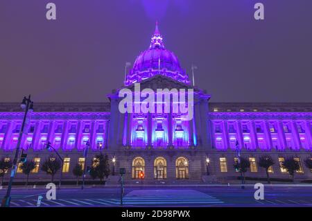 San Francisco City Hall lights up in purple to honor the country hospitality industry, California, USA.