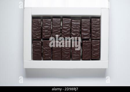 Plain Chocolate candy in the white box isolated on white background Stock Photo