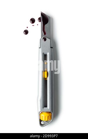 Bloody clerical knife isolated on white background. Stock Photo