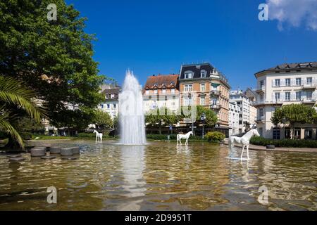 Augustaplatz and fountain in Baden Baden. During the horse race at the racecourse in Iffezheim. Baden Wuerttemberg, Germany, Europe Stock Photo