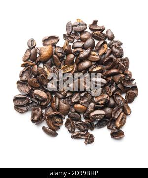 Cracked coffee beans isolated on white background. Stock Photo