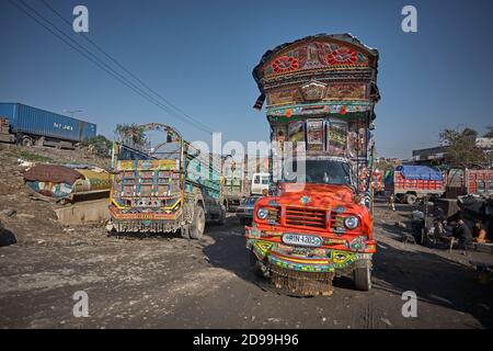 Rawalpindi, Pakistan, December 2008.  One of the country's typical decorated transport trucks waiting in the parking lot to be loaded. Stock Photo