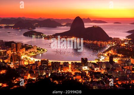 Rio de Janeiro just before Sunrise, City Lights, and Sugarloaf Mountain Stock Photo