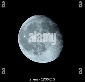 90.8% Waning Gibbous Moon with a heavily cratered terminator visible in clear overnight sky. Credit: Malcolm Park/Alamy. Stock Photo