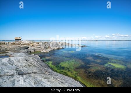 An open wilderness hut on Ytterland island, Raasepori, Finland Stock Photo