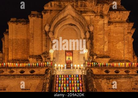 Colourful lanterns decorate ancient Buddhist pagoda.